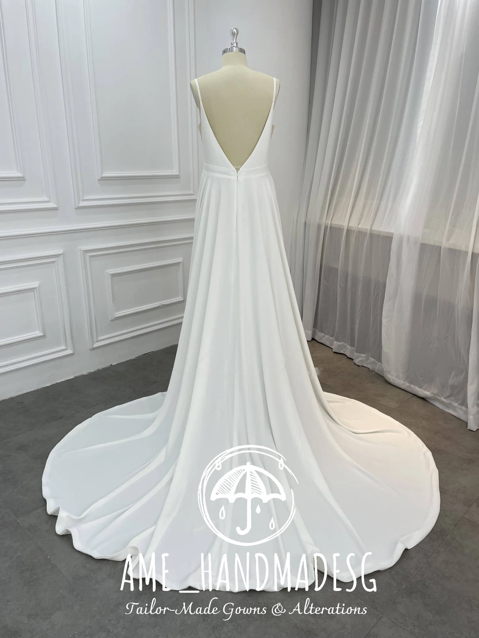 Minimalist A-Line Satin Wedding Gown with Plunging V-Neckline & Flowing Train - Image 2