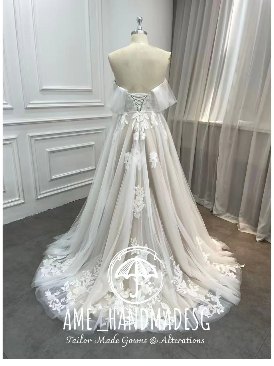 Ethereal Off-Shoulder Tulle Wedding Gown with Floral Lace Appliqué & Flowing Train - Image 2
