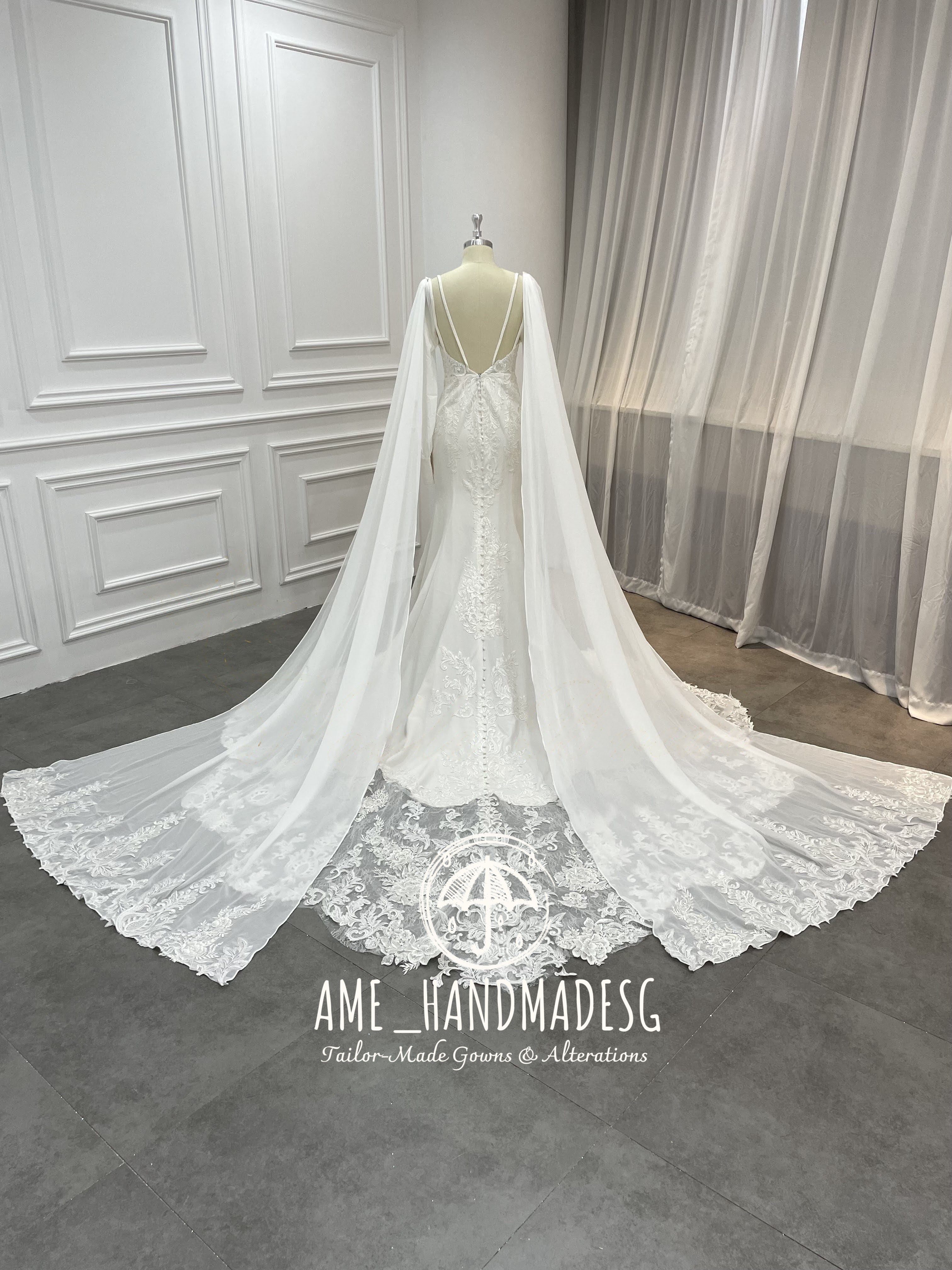 Regal Serenity Mermaid Gown with Dramatic Cape Sleeves - Image 2